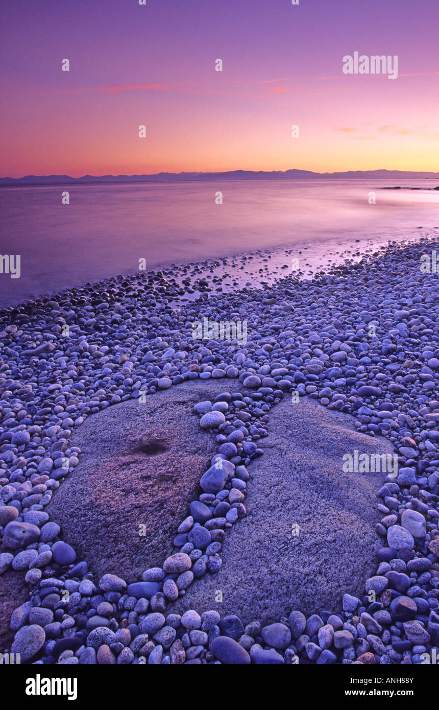 Roberts Creek pebble beach and the Strait of at sundown