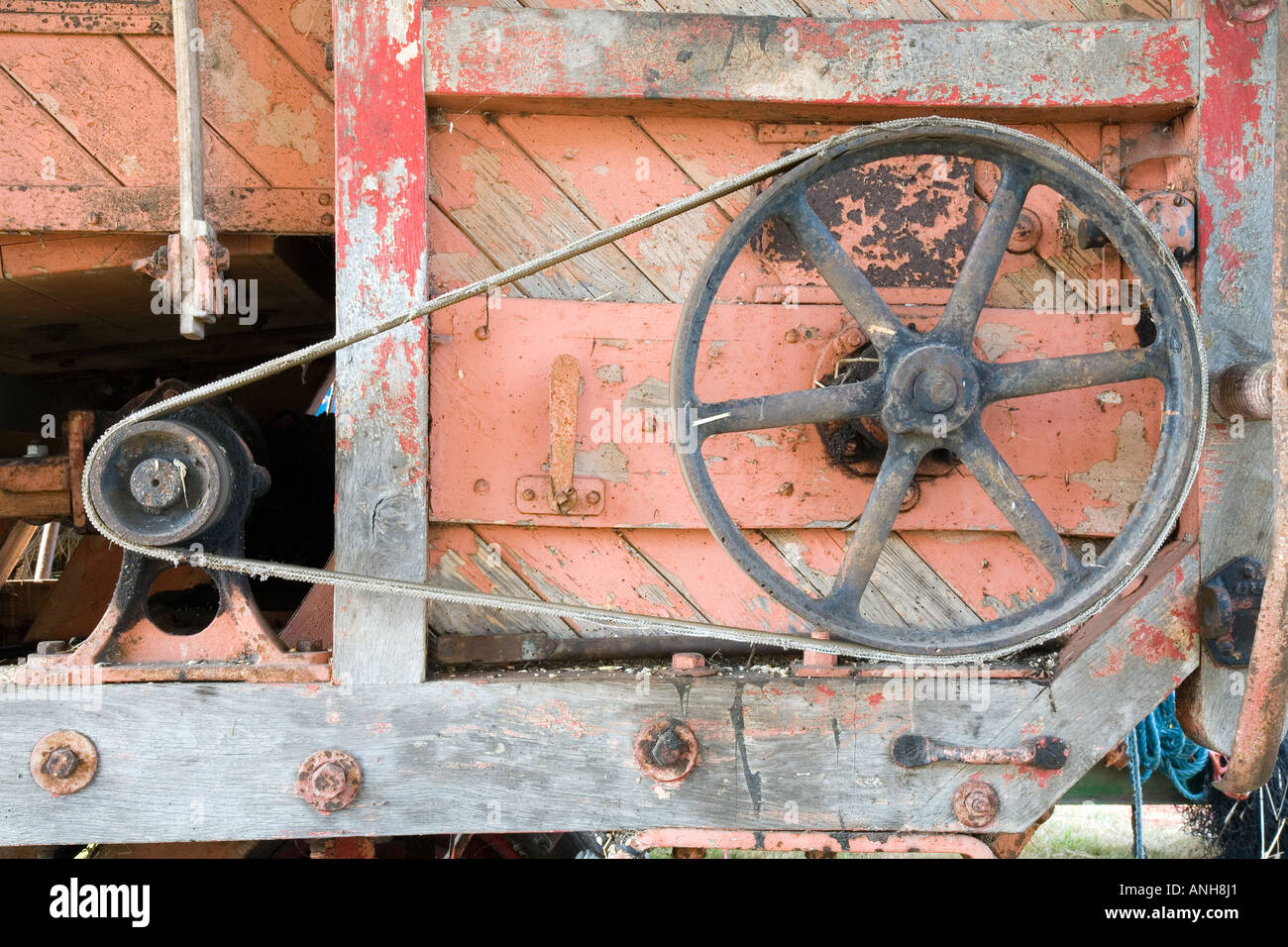 Pulley belt drive ratio on old farm machine Stock Photo