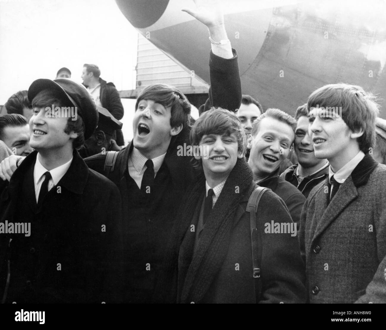 BEATLES Arriving back at Heathrow Airport London 22 Feb 1964 after their first US trip Stock Photo