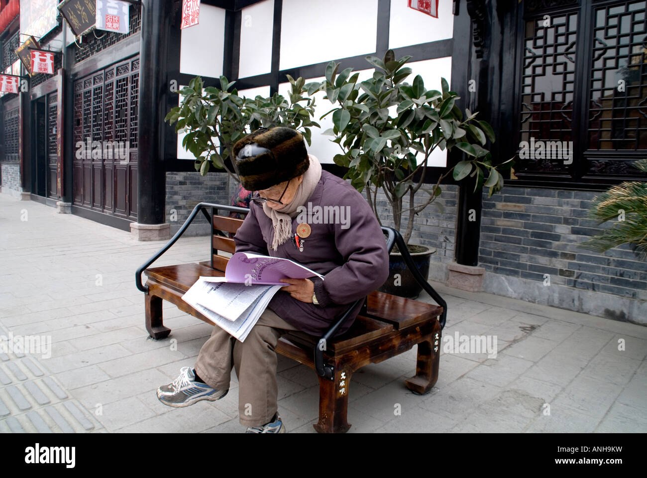 a retire old man in the park read newspaper. Stock Photo