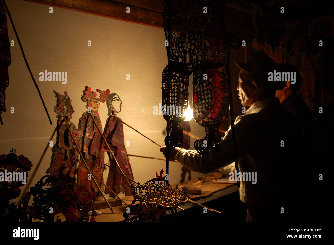 China Yunnan Baoshan lisu minority festival people play traditional shadowgraph Stock Photo