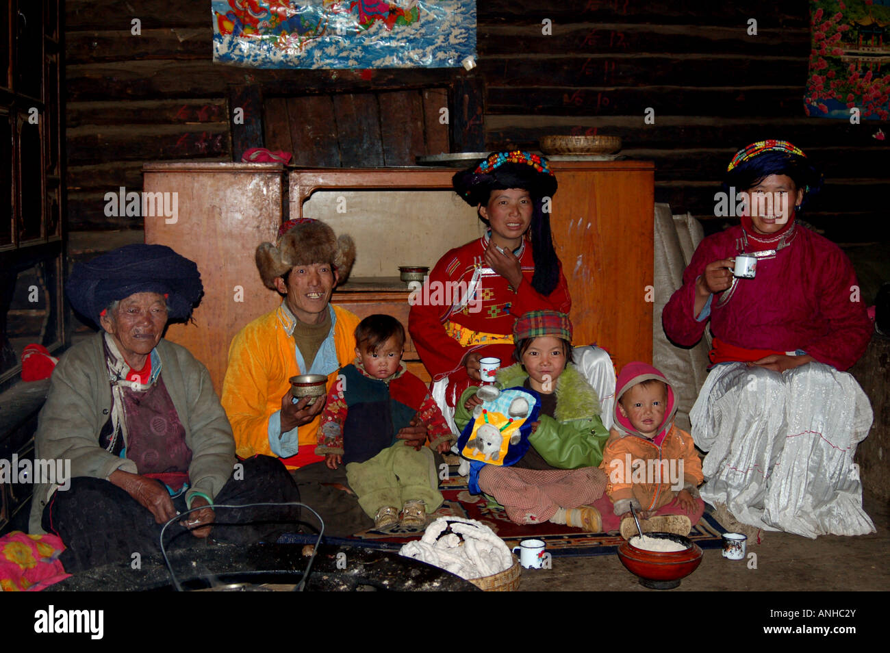 chinese Mosu minority grandmother with family together Stock Photo