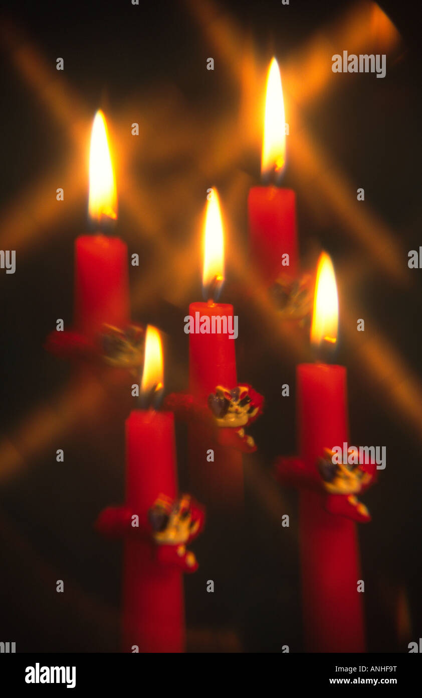Red Candles with Christmas Decorations Stock Photo