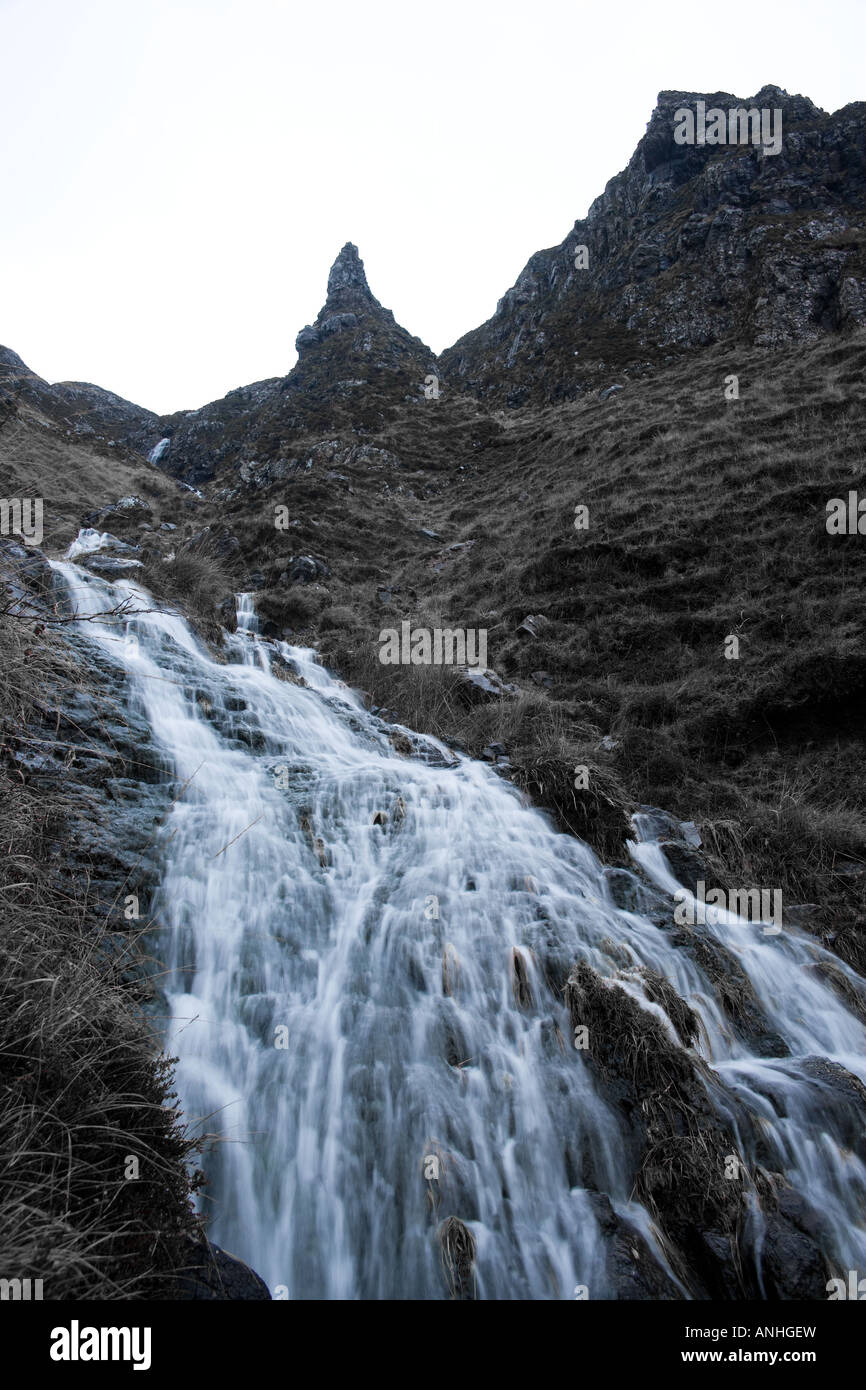 Waterfall rushing down from mountain Stock Photo - Alamy