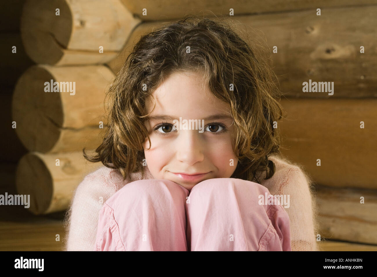 Preteen girl sits on wooden hi-res stock photography and images - Alamy