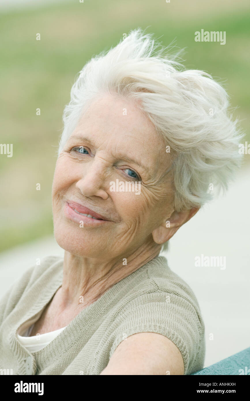 Senior woman smiling at camera, portrait Stock Photo