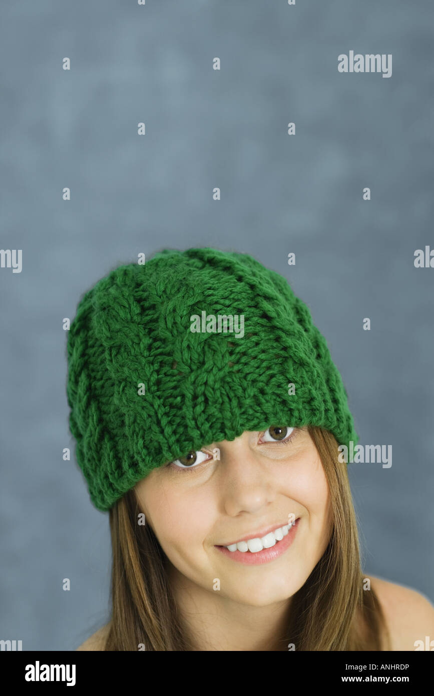 Teenage girl wearing knit hat, portrait Stock Photo Alamy
