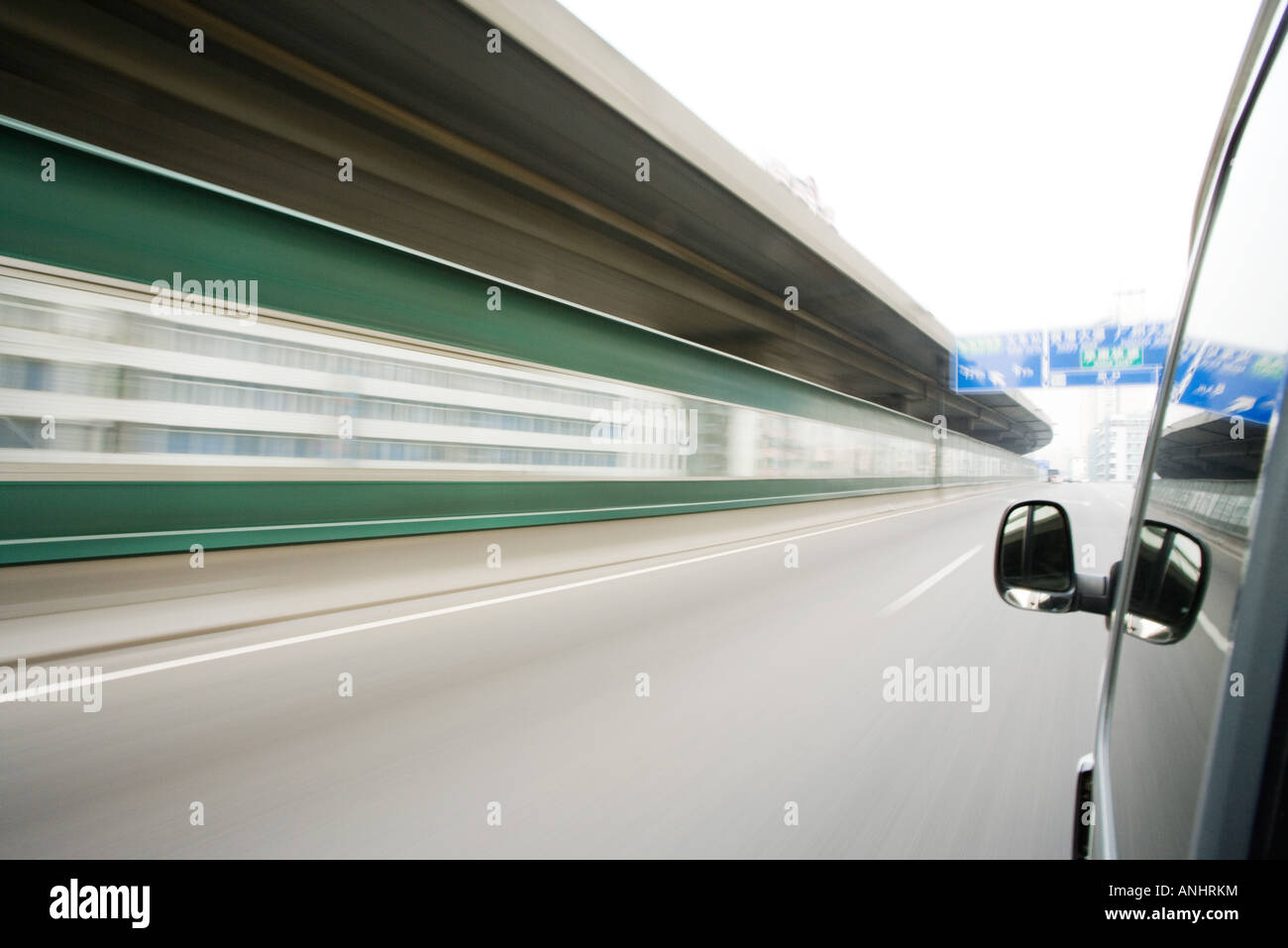Freeway Window View Freeway wall viewed from car window, blurred motion Stock Photo - Alamy