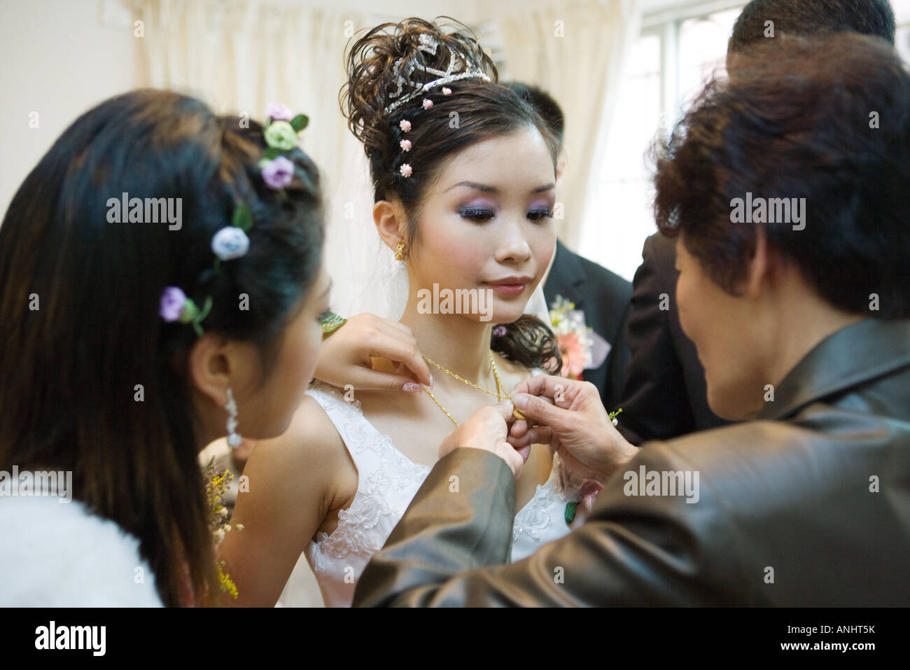 Chinese wedding, giving of jewelry to the bride Stock Photo