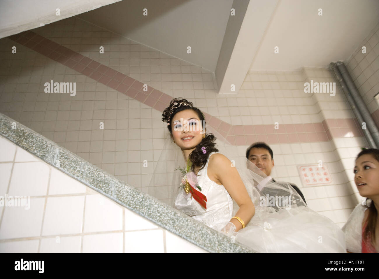 Three wedding dresses on stairs hi-res stock photography and images - Alamy