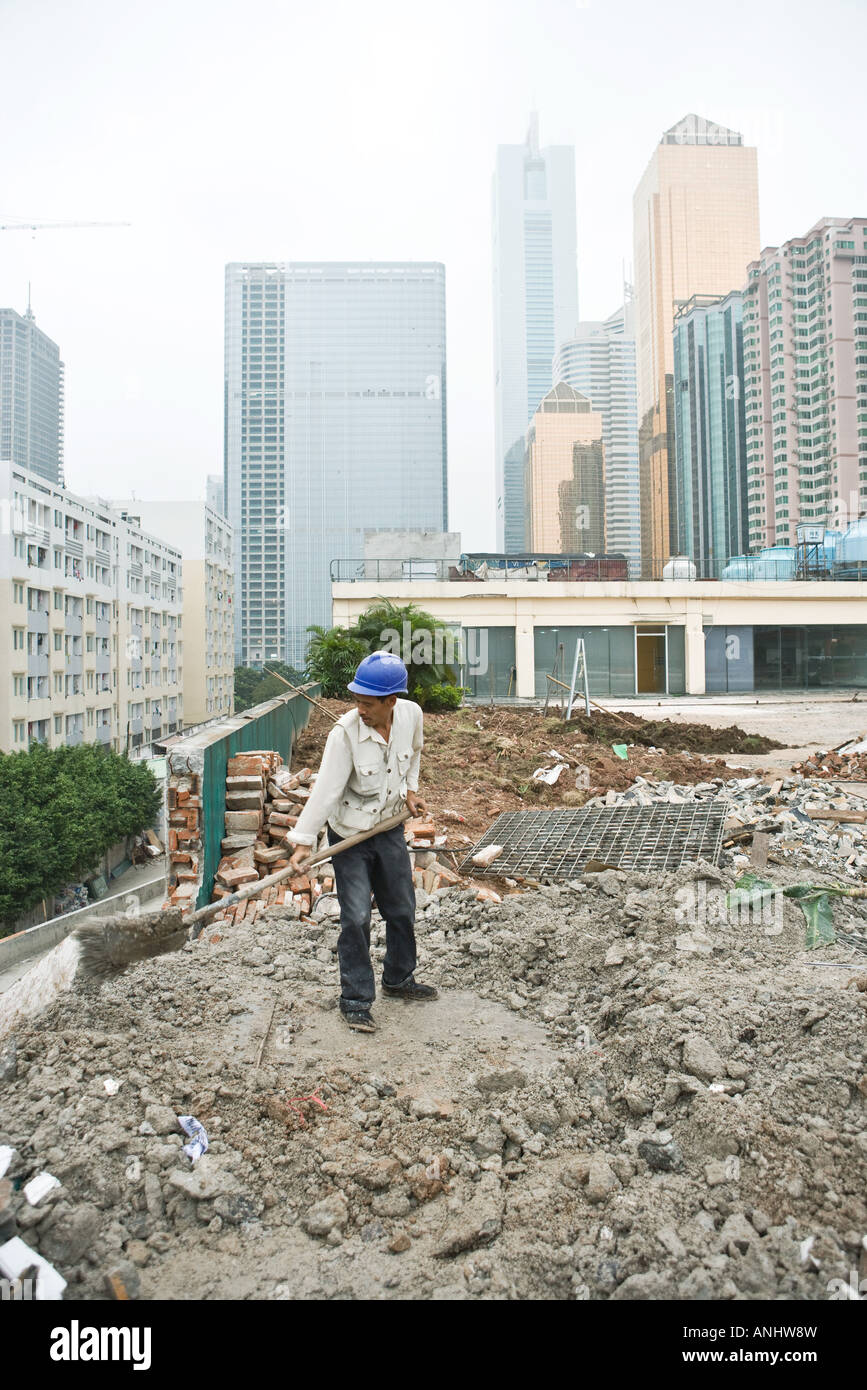 Worker in construction site Stock Photo - Alamy