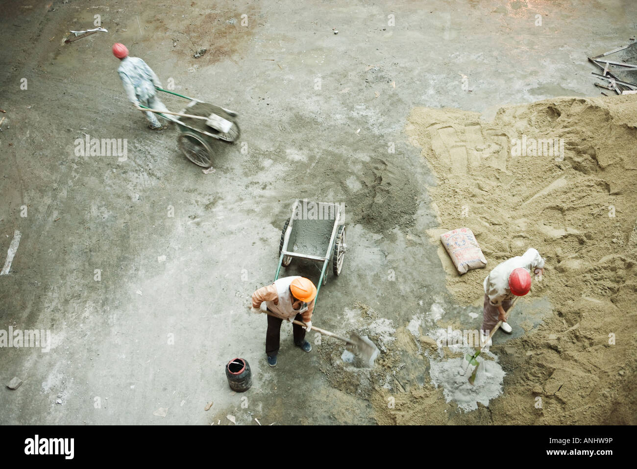 Workers at construction site, high angle view Stock Photo