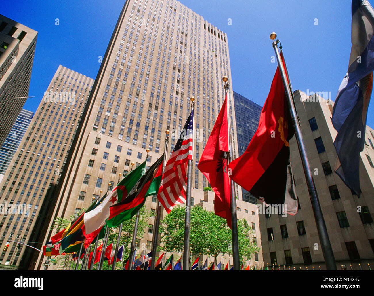 New York City Rockefeller Center, 30 Rockefeller Center, (30 Rock), (General Electric Building), (RCA Building). International flags flying. Art Deco. Stock Photo