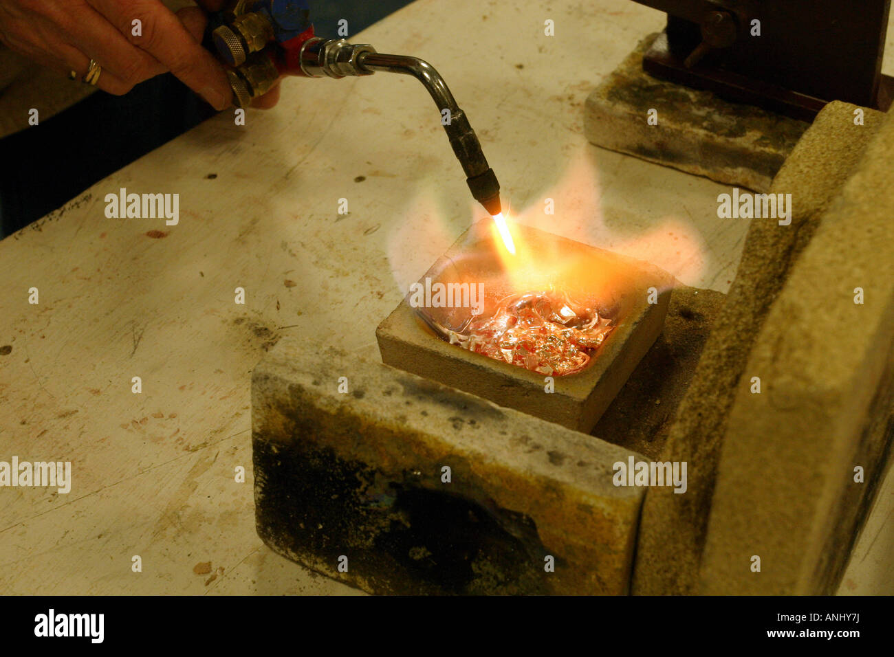 melting silver with blowtorch Stock Photo - Alamy