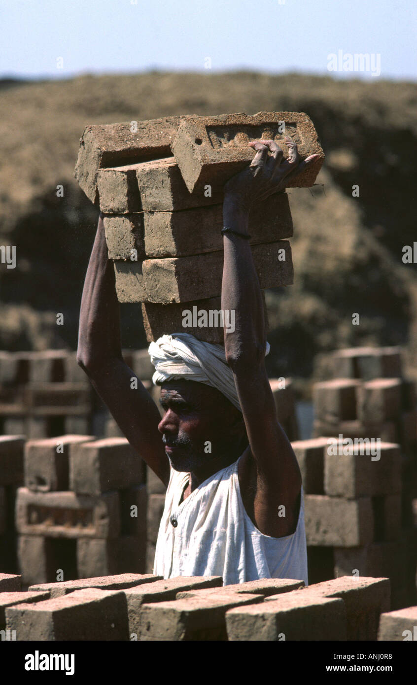 Carrying Bricks On Head High Resolution Stock Photography and Images