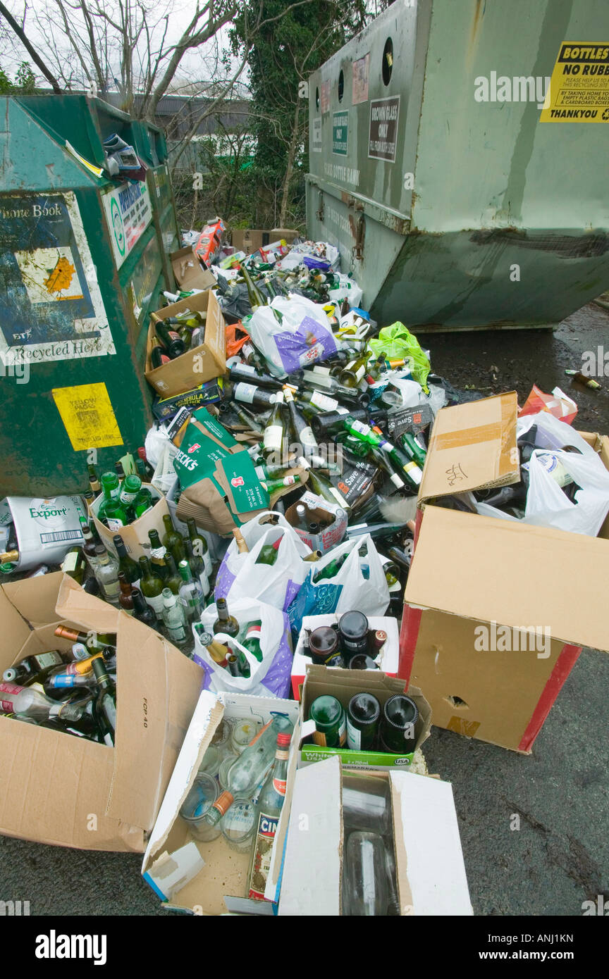 A full bottle bank overflowing with bottles to be recycled Ambleside UK