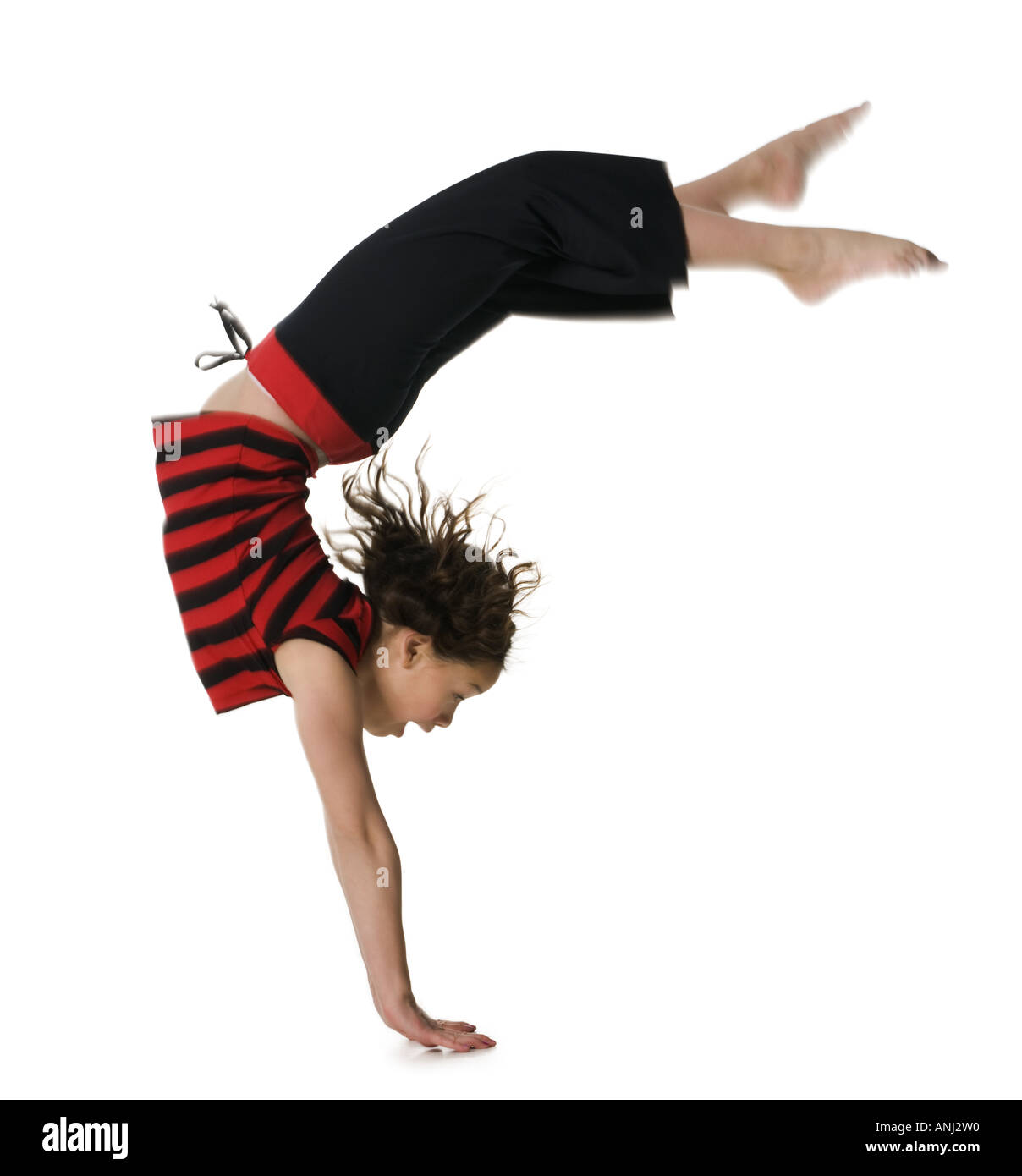 Side profile of a girl doing handstand Stock Photo