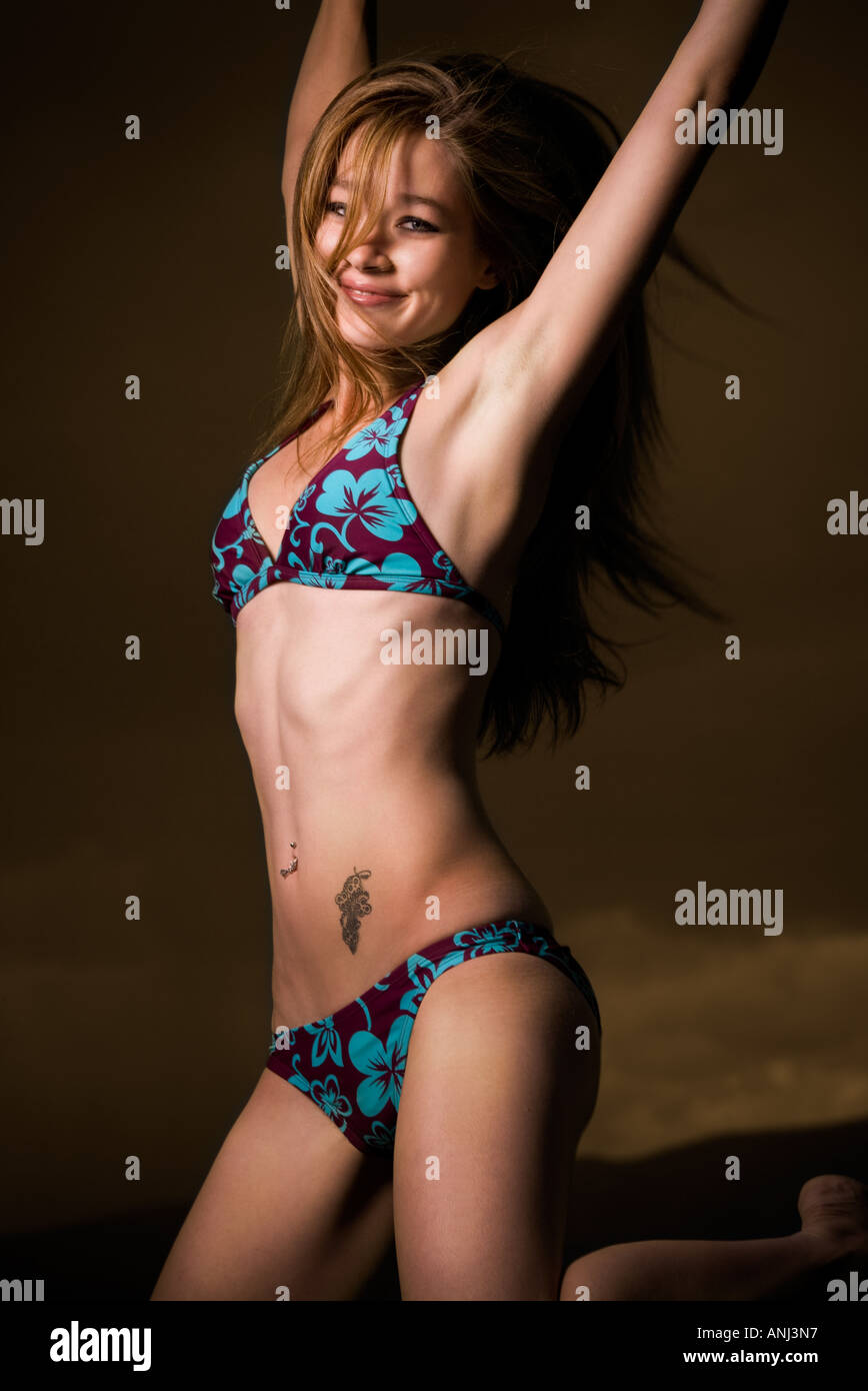Female young adult in bikini Stock Photo - Alamy