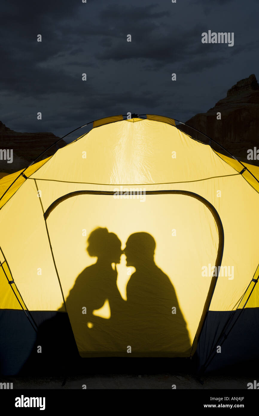 Silhouette couple sitting inside tent hi-res stock photography and ...