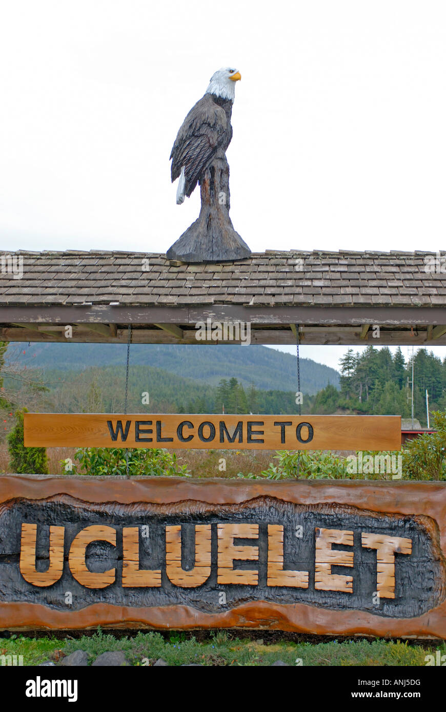 Visitors Welcome sign at the entrance to Ucluelet on the Northern tip of Vancouver Island BC Canada Stock Photo