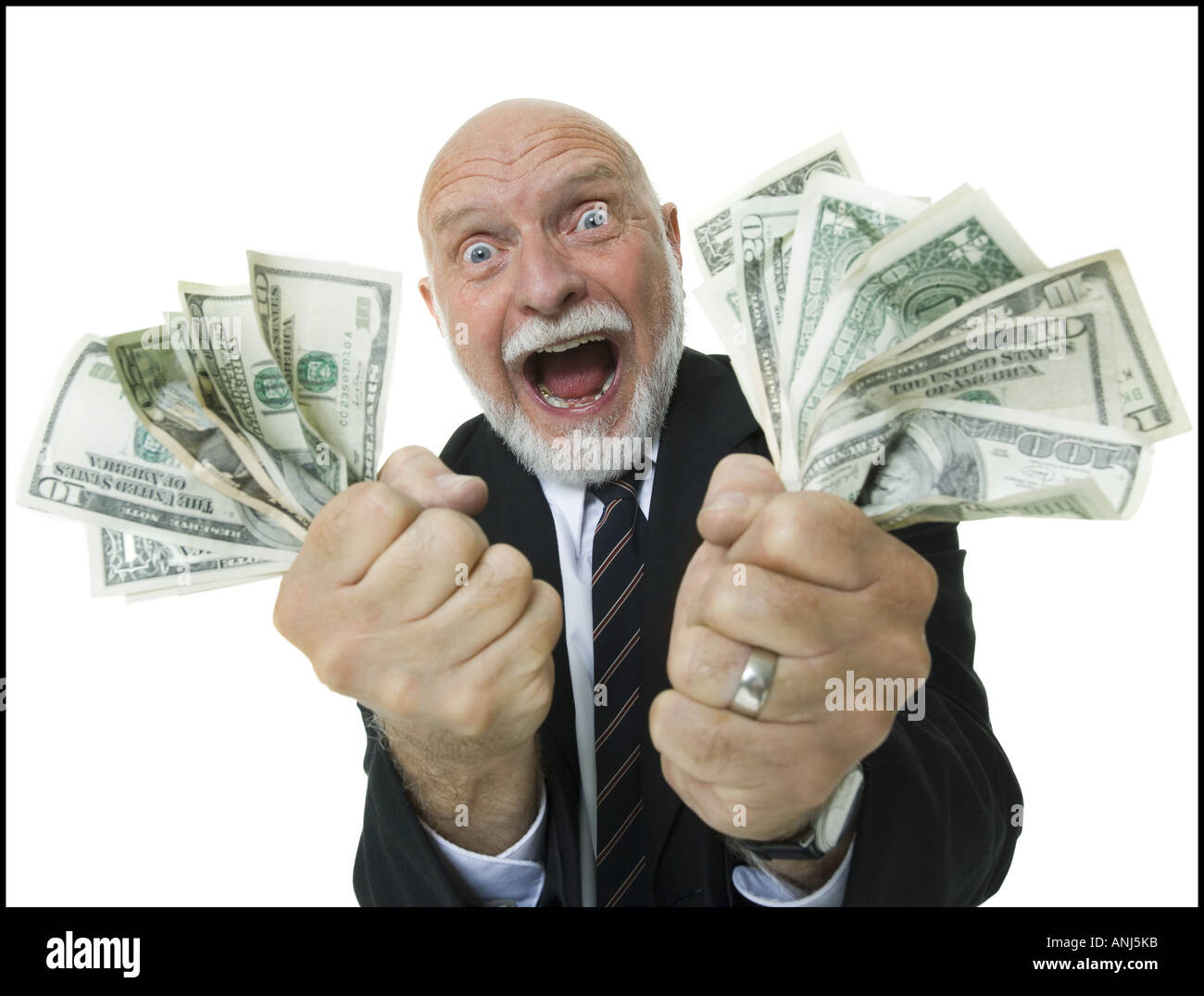 Portrait of a businessman holding dollar bills Stock Photo - Alamy