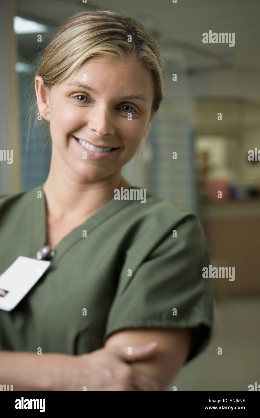 Portrait smiling nurse arms hi-res stock photography and images - Alamy
