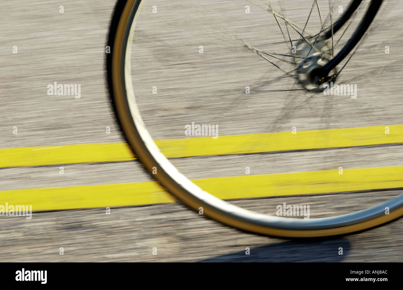 wheel of racing bicycle on track Stock Photo