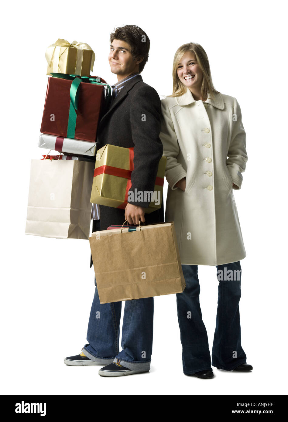 Close up of a man with a woman carrying shopping bags hires stock