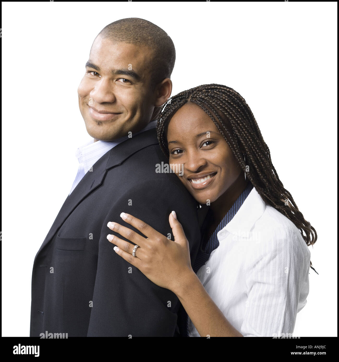 Portrait of a young man smiling with a young woman Stock Photo - Alamy