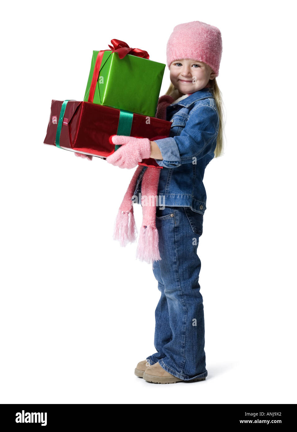 Portrait of a girl holding Christmas presents Stock Photo
