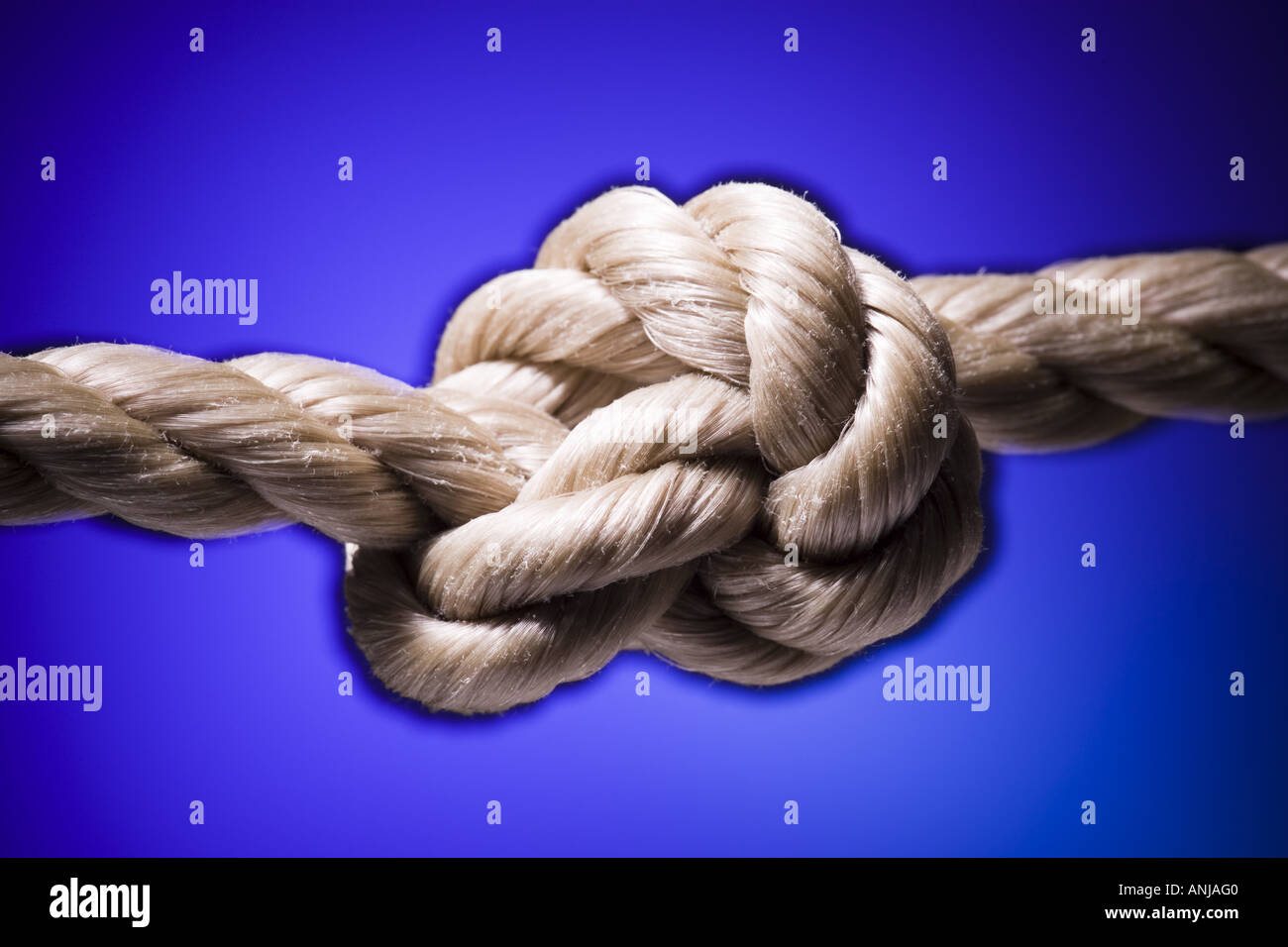 Close up of a tied knot on a rope Stock Photo
