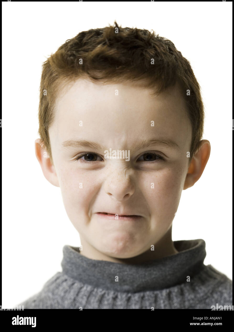 Portrait of a boy making a face Stock Photo
