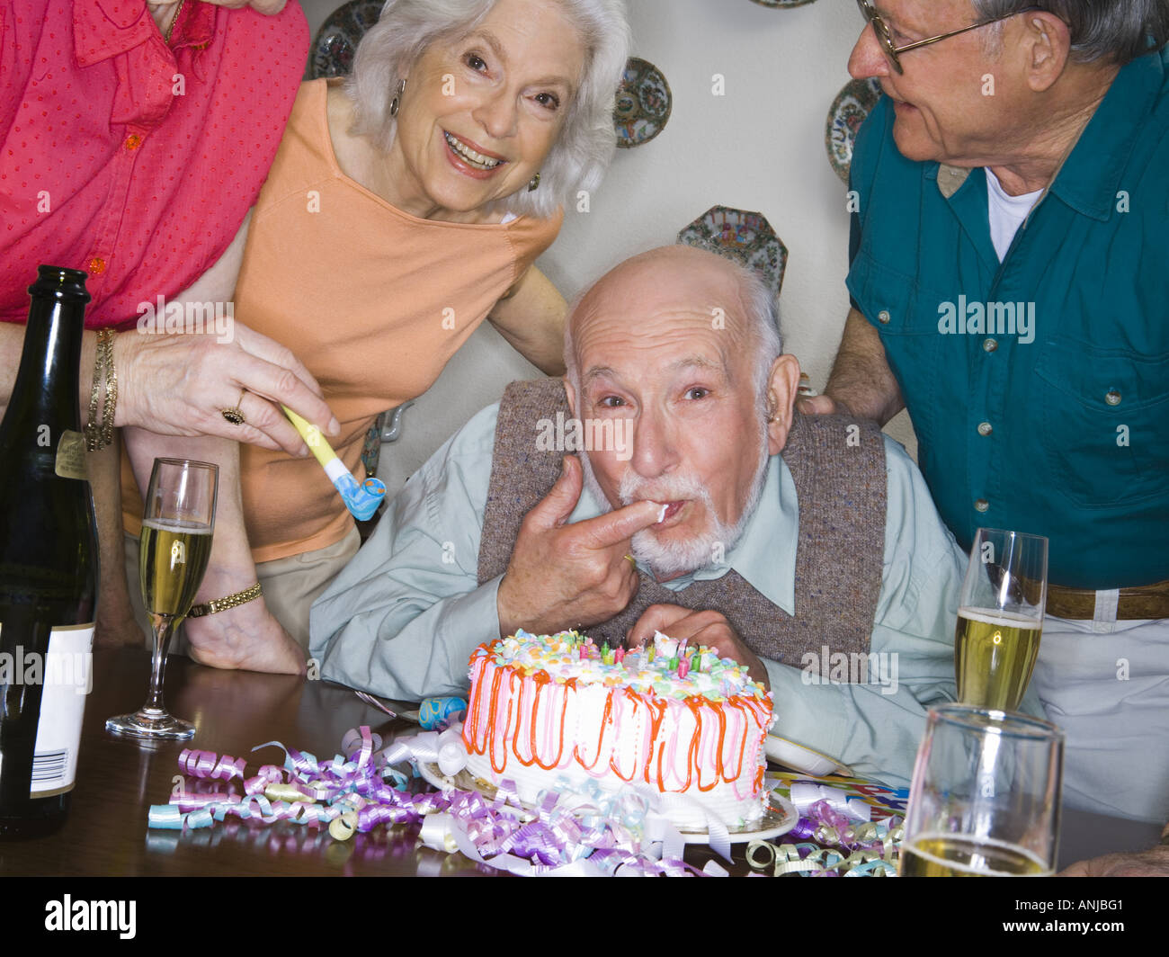 Portrait of a group of senior people celebrating a birthday Stock Photo