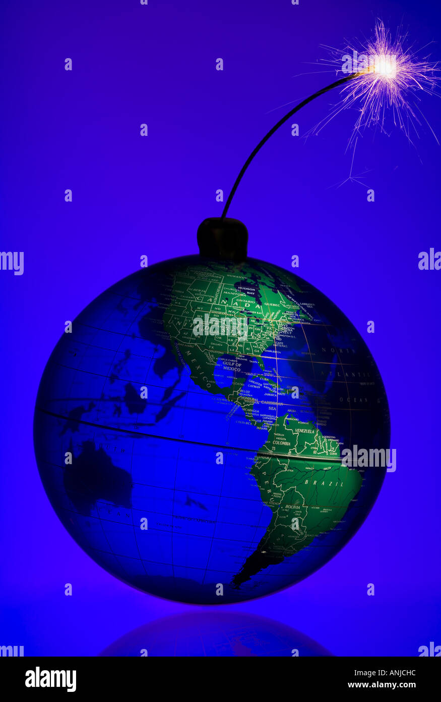 Globe with burning fuse Stock Photo