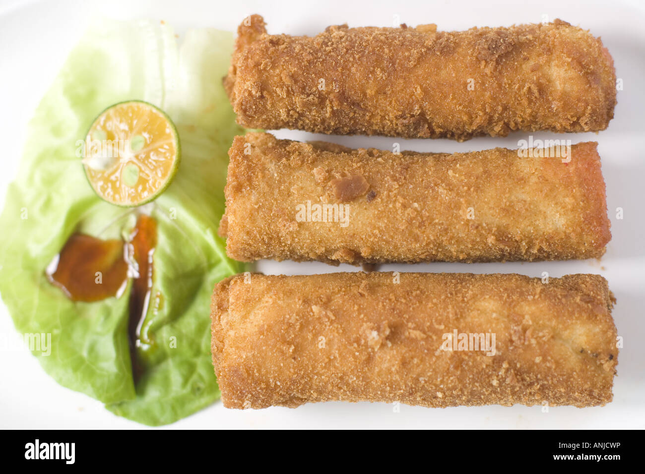 Malaysian deepfried fish rolls Stock Photo Alamy