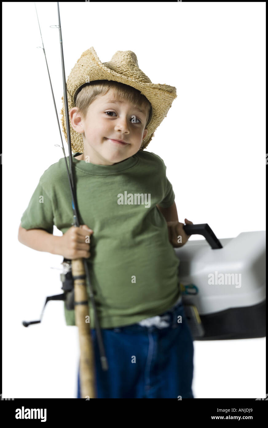 Portrait of a boy holding a fishing rod Stock Photo