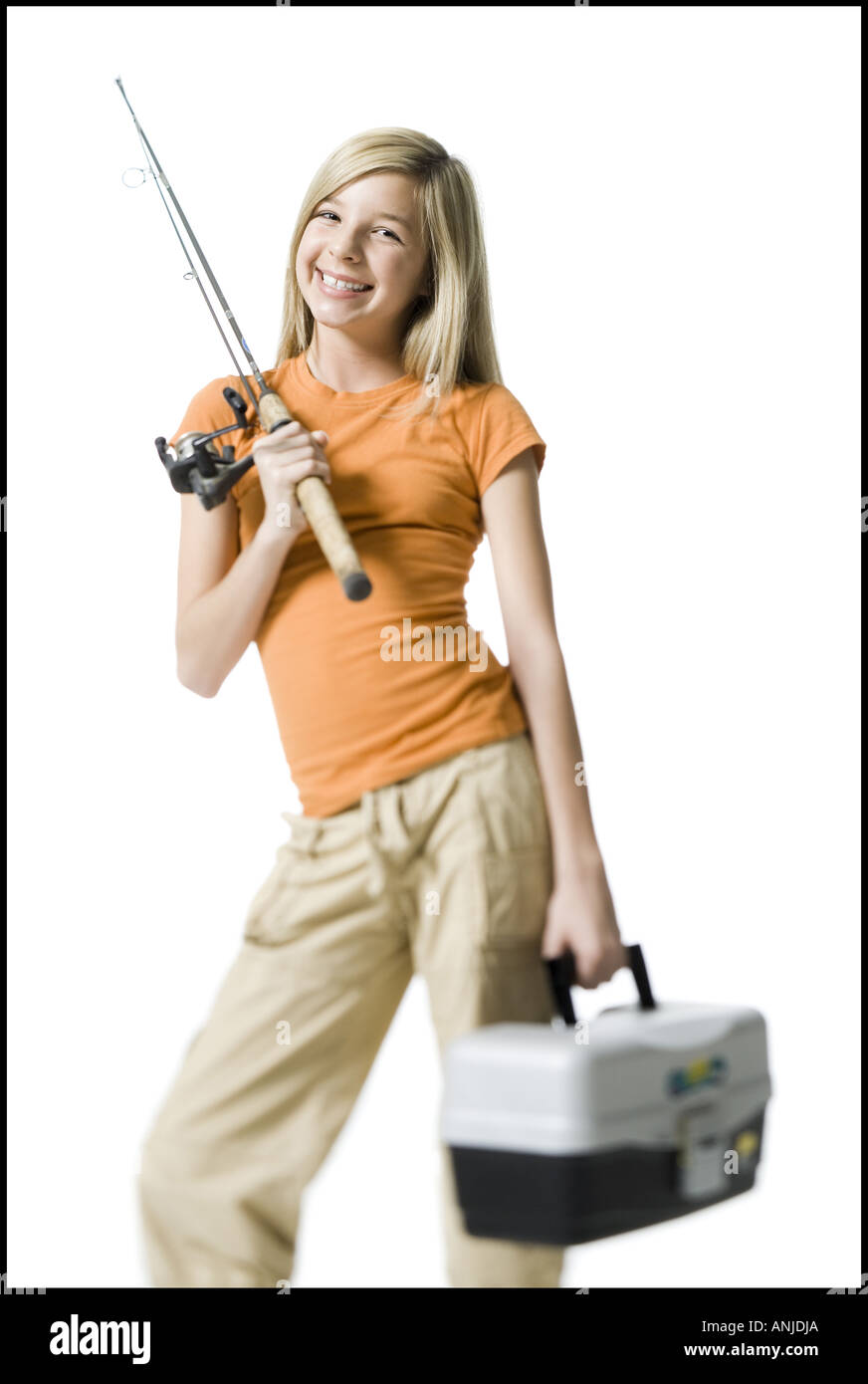Portrait of a girl holding a fishing rod Stock Photo