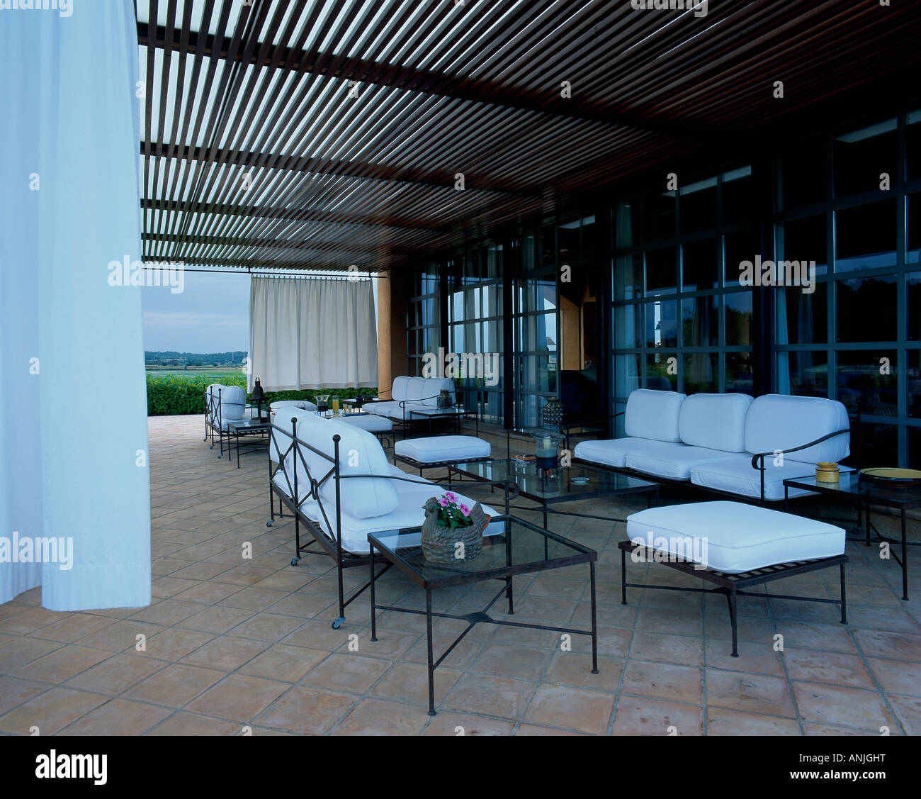 View of couches and seats arranged in a lanai Stock Photo Alamy