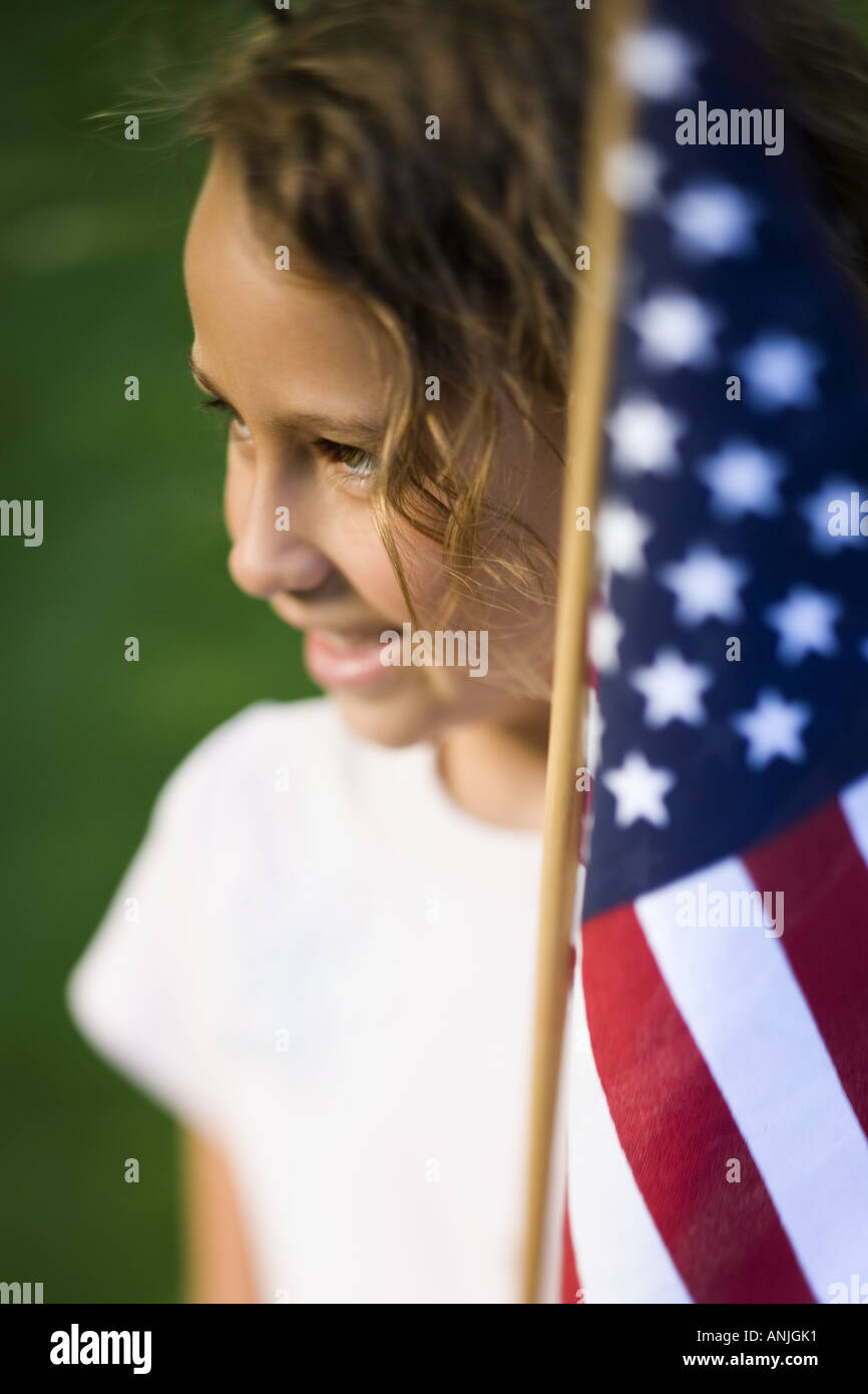 Close up of a girl holding an American Flag Stock Photo - Alamy