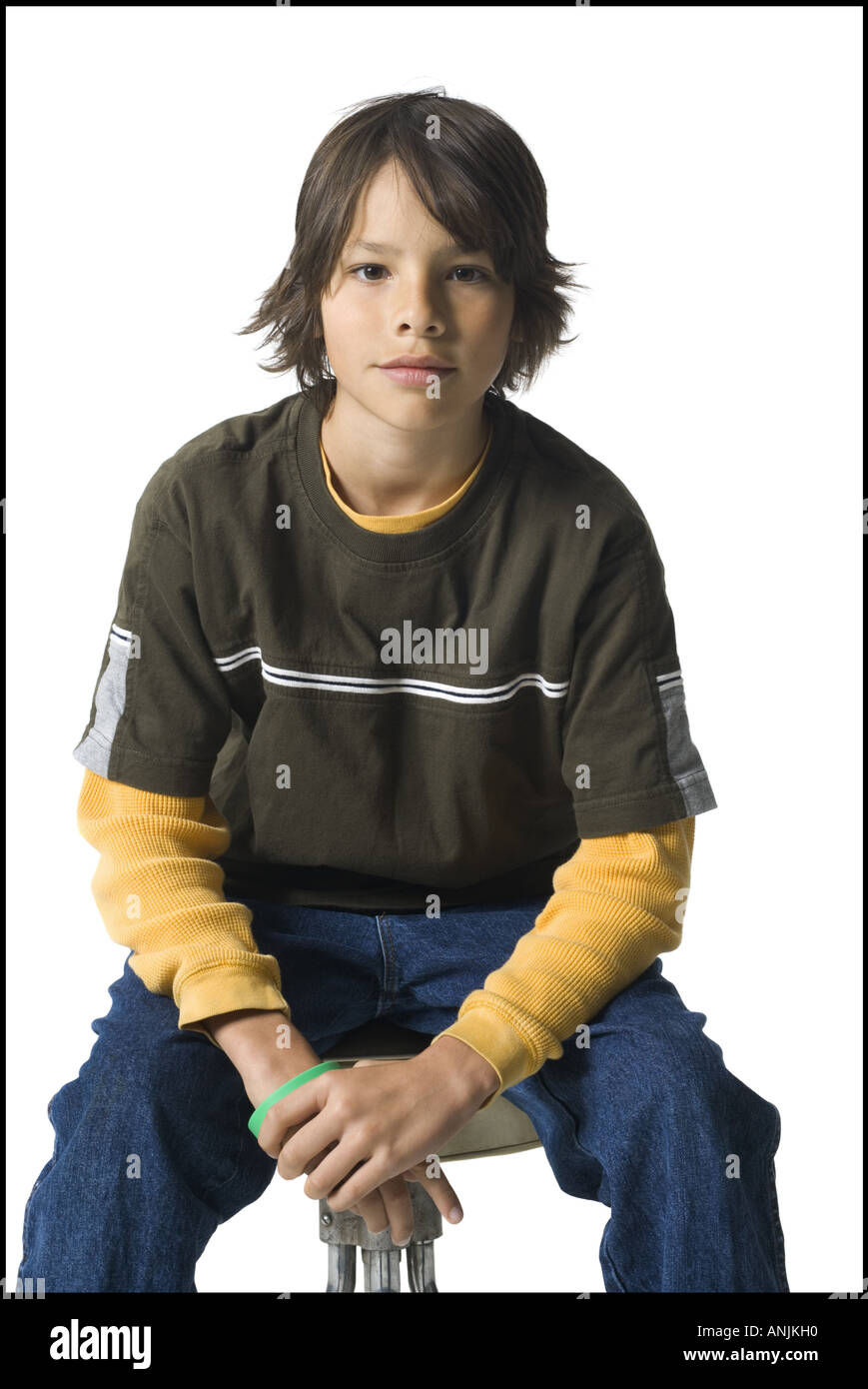 Studio portrait boy on stool hi-res stock photography and images - Alamy
