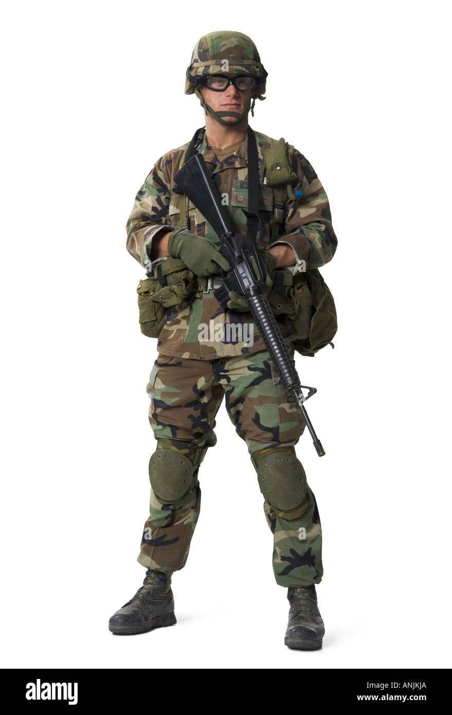 Portrait of a soldier holding a rifle Stock Photo - Alamy