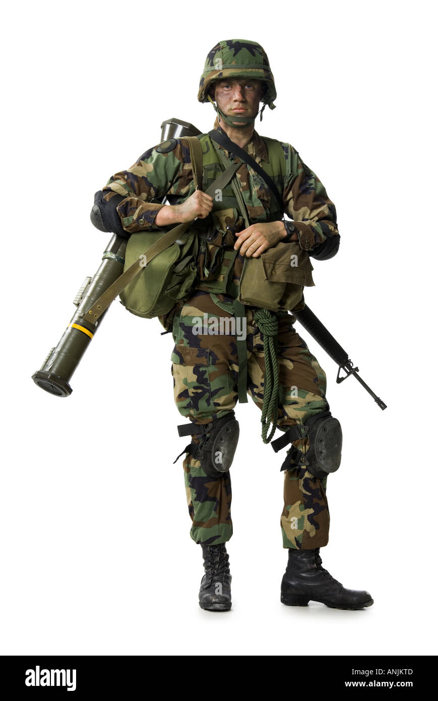 Portrait of a soldier carrying backpack and weapons Stock Photo Alamy