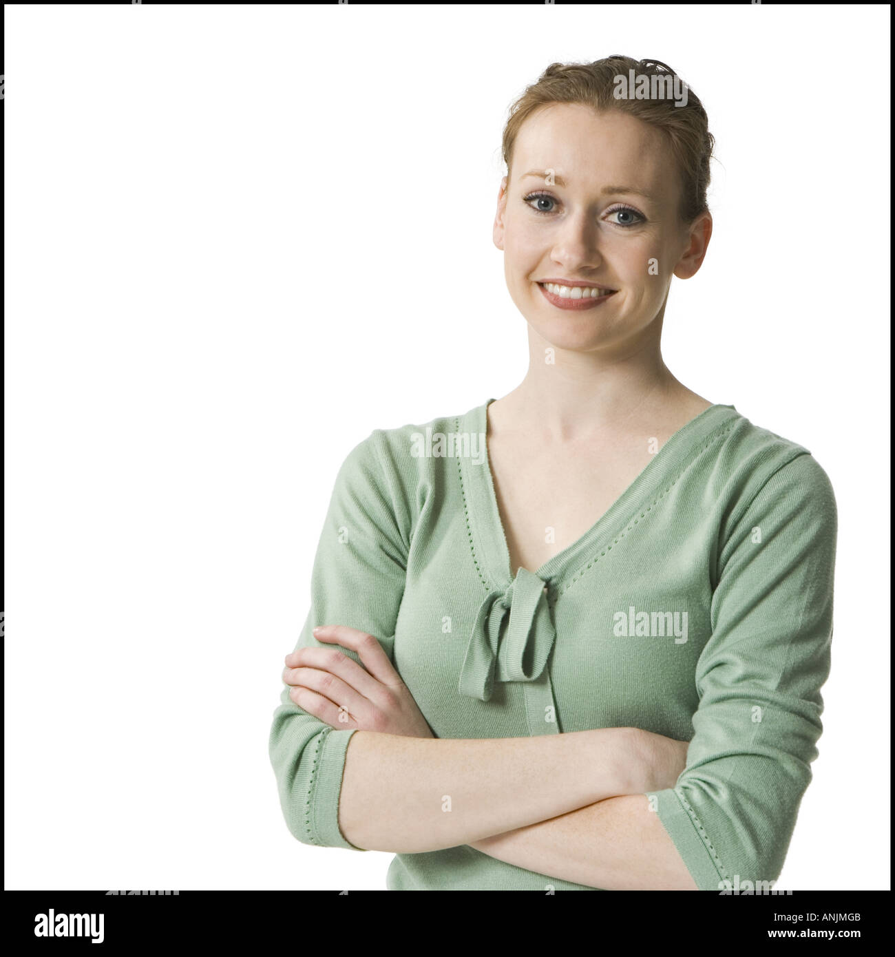 Rubberball woman arms crossed hi-res stock photography and images - Alamy
