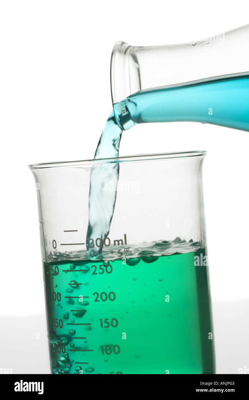 Chemical being poured into a beaker Stock Photo Alamy