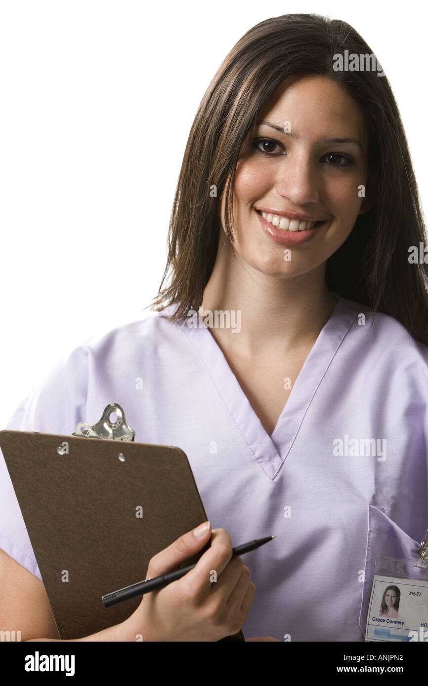 Young nurse holding clipboard hi-res stock photography and images - Alamy
