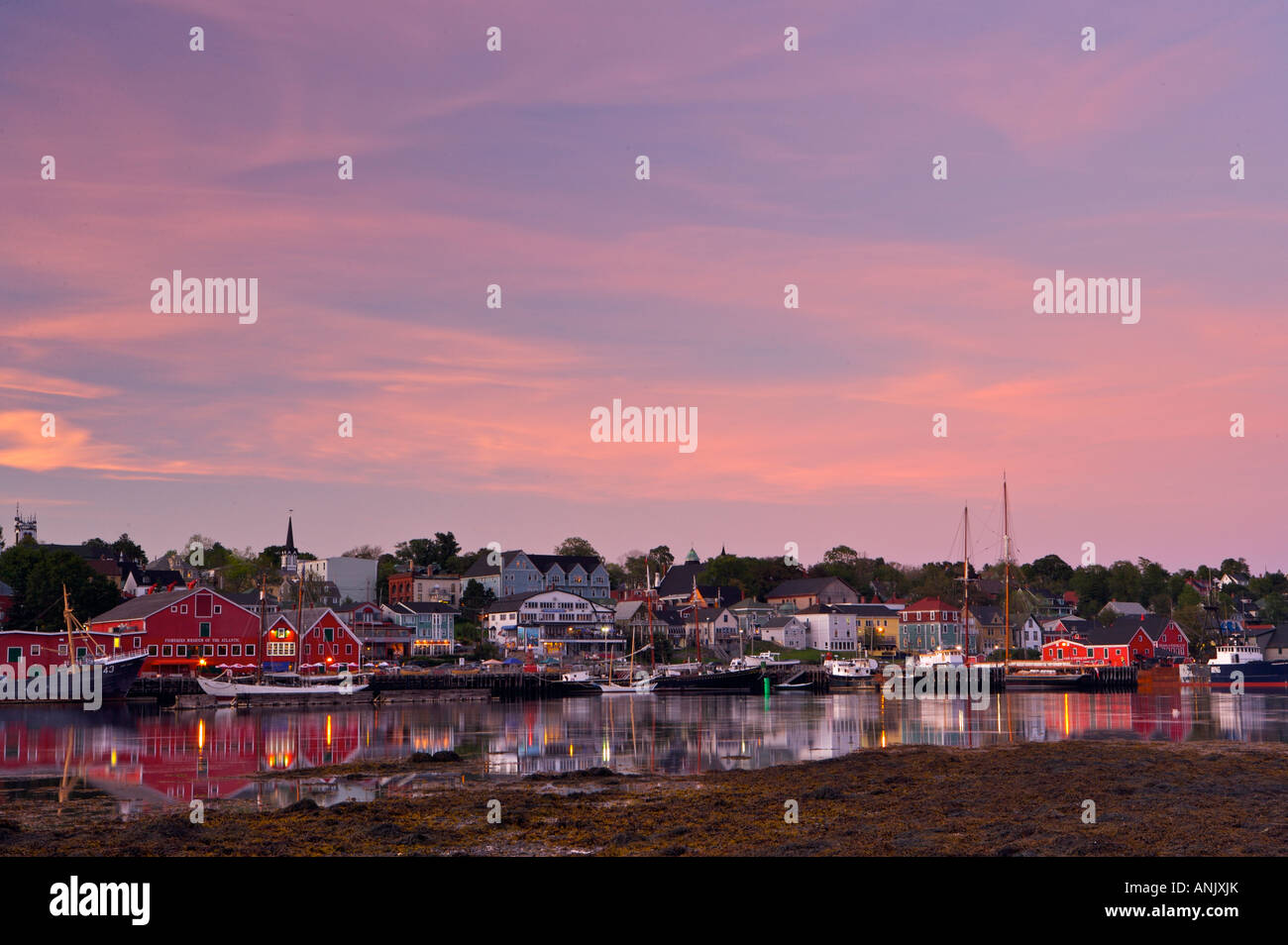 Waterfront and town of Lunenburg at sunset, Lunenburg Harbour, Lighthouse Route, Highway 3, Nova Scotia, Canada. Stock Photo