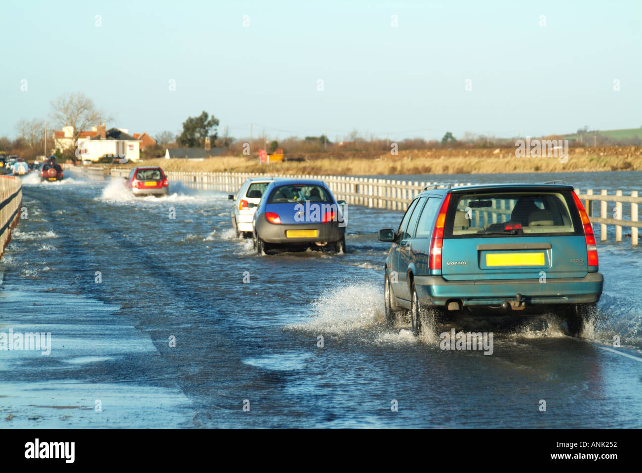 High tide flooding in Blackwater & Colne estuaries cover Strood causeway Essex mainland road link to West Mersea island town & East Mersea village UK Stock Photo