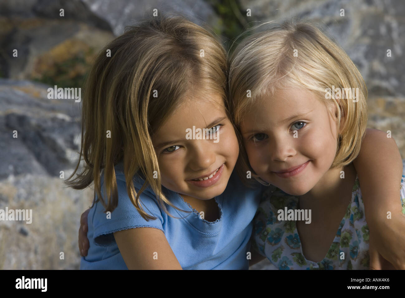 Portrait of two girls smiling Stock Photo - Alamy
