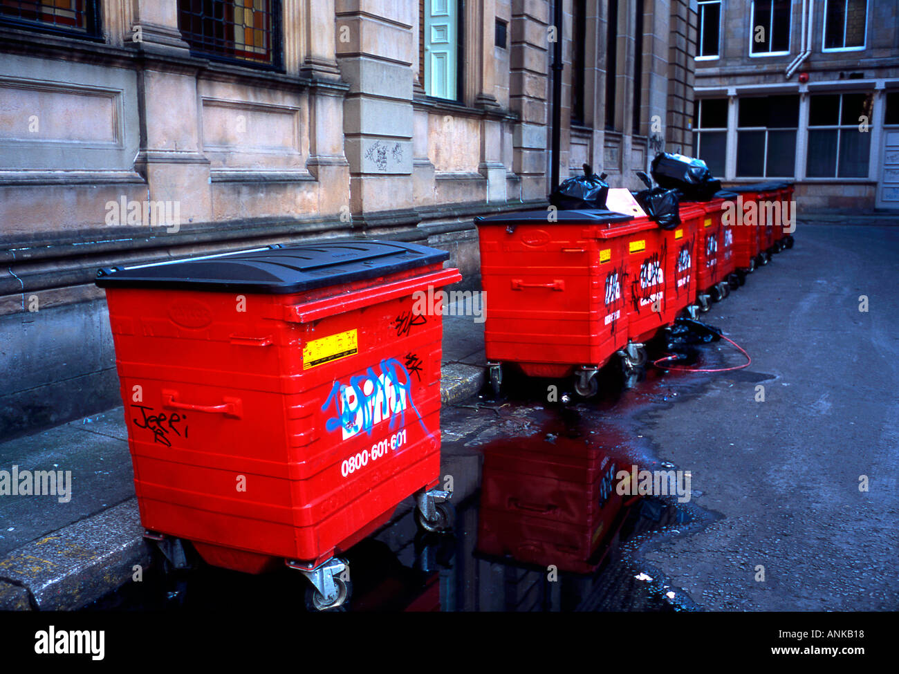 Red rubbish bins in Glasgow city centre Stock Photo Alamy