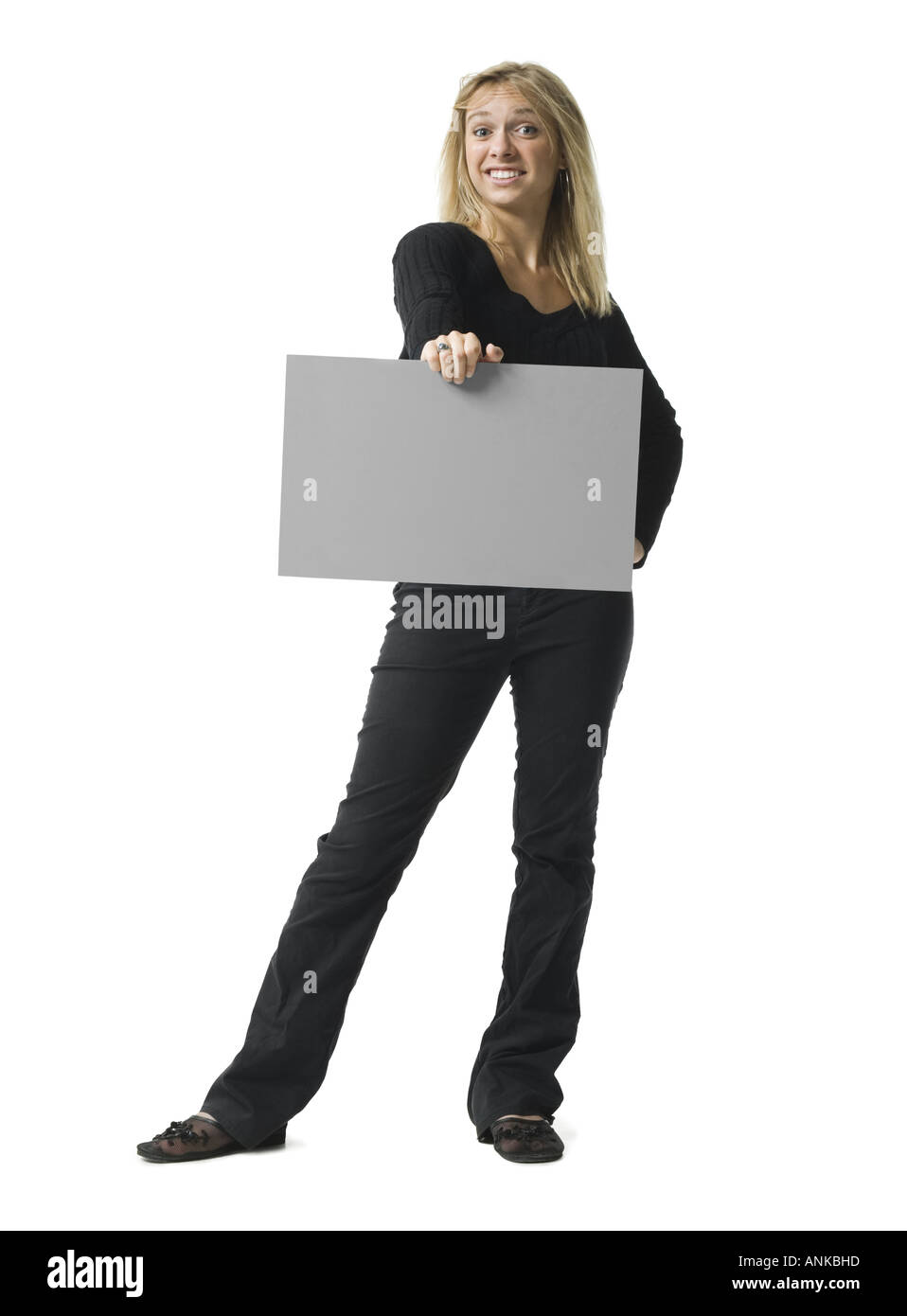 Portrait of a young woman holding a blank sign Stock Photo - Alamy